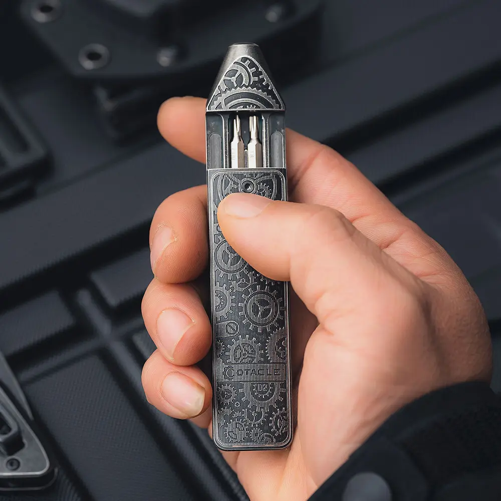 thumbnail interactive-video image 1 of Olight Otacle D2 Ti Gears Multi-Bit Driver – Titanium Fidget Slider & Gear Etching Limited 1 of 6